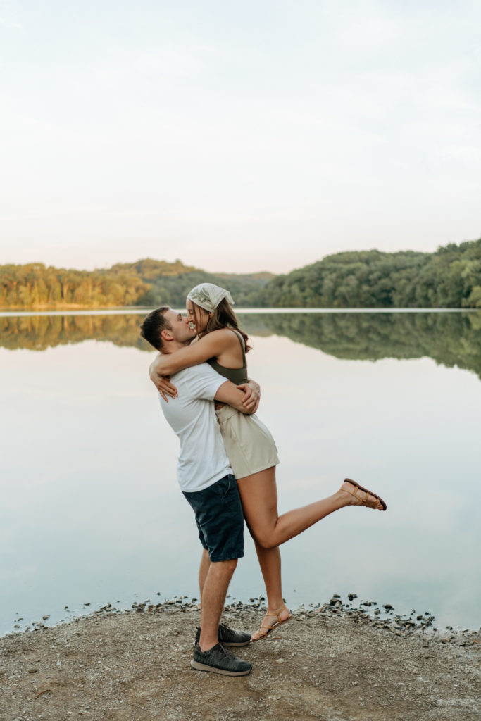 couple taking engagement session pictures