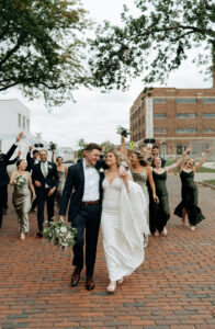 This is a picture of a bridal party taking pictures on the wedding day