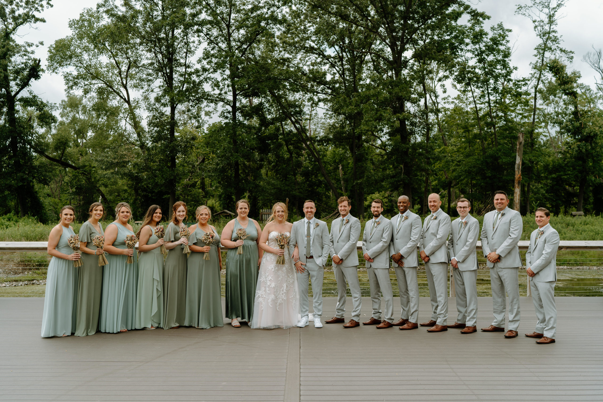 This is a wedding party with the bride and groom at Indian Creek Nature Center