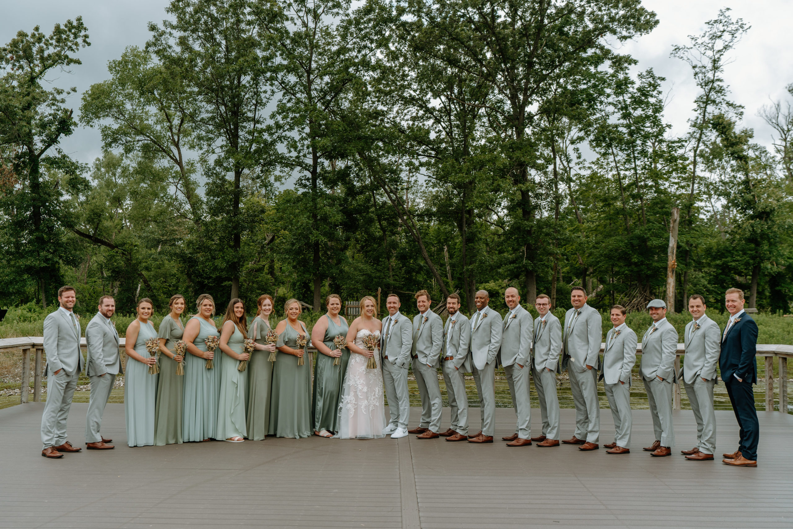 This is a wedding party with the bride and groom at Indian Creek Nature Center