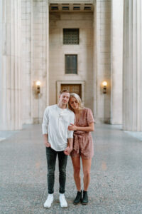 couple standing together at the war memorial in downtown nashville tn