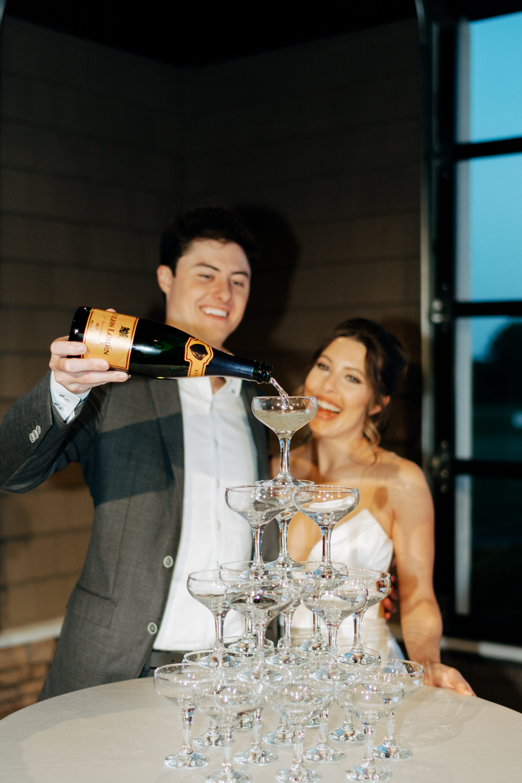 couple having a drink at hermitage golf weddings